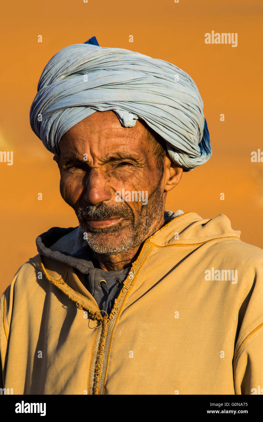 Camel driver portrait in the Erg Chebbi sand dunes Stock Photo