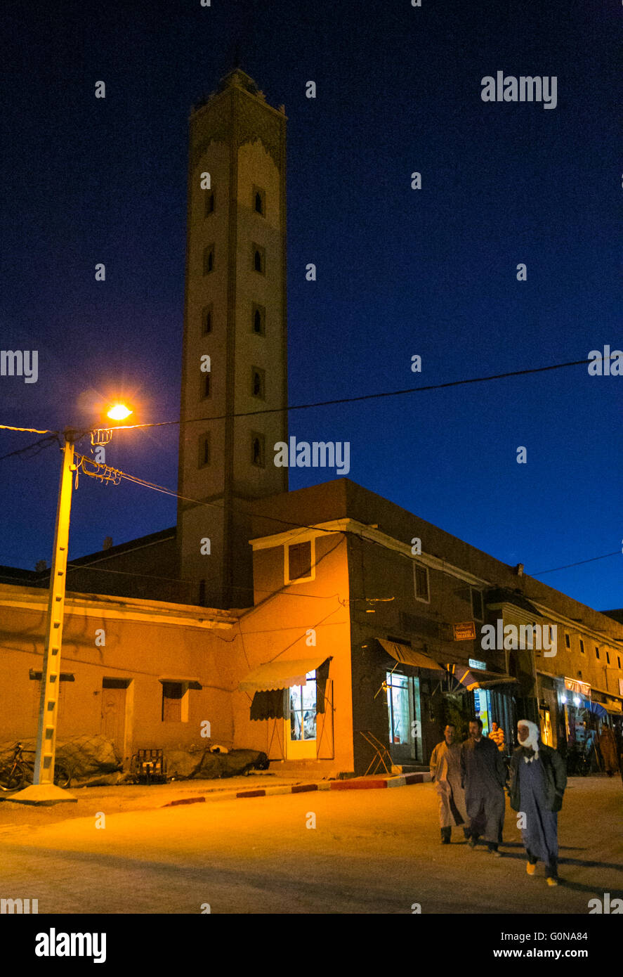 Mosque at night in Tafrout and men in the street after the pray Stock Photo
