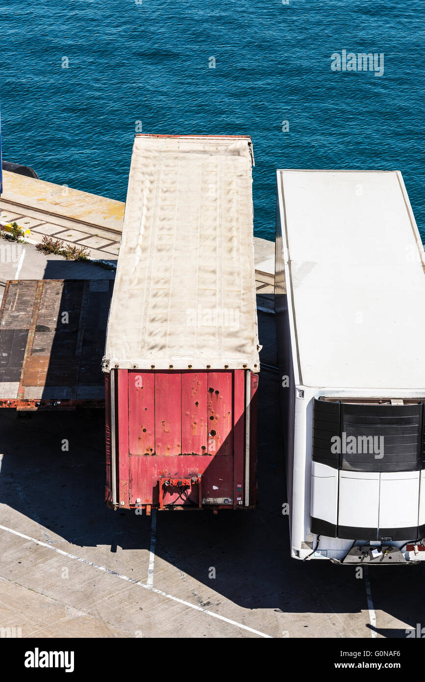 Reefer container and other types of containers waiting to board at the port of Barcelona, Catalonia, Spain Stock Photo