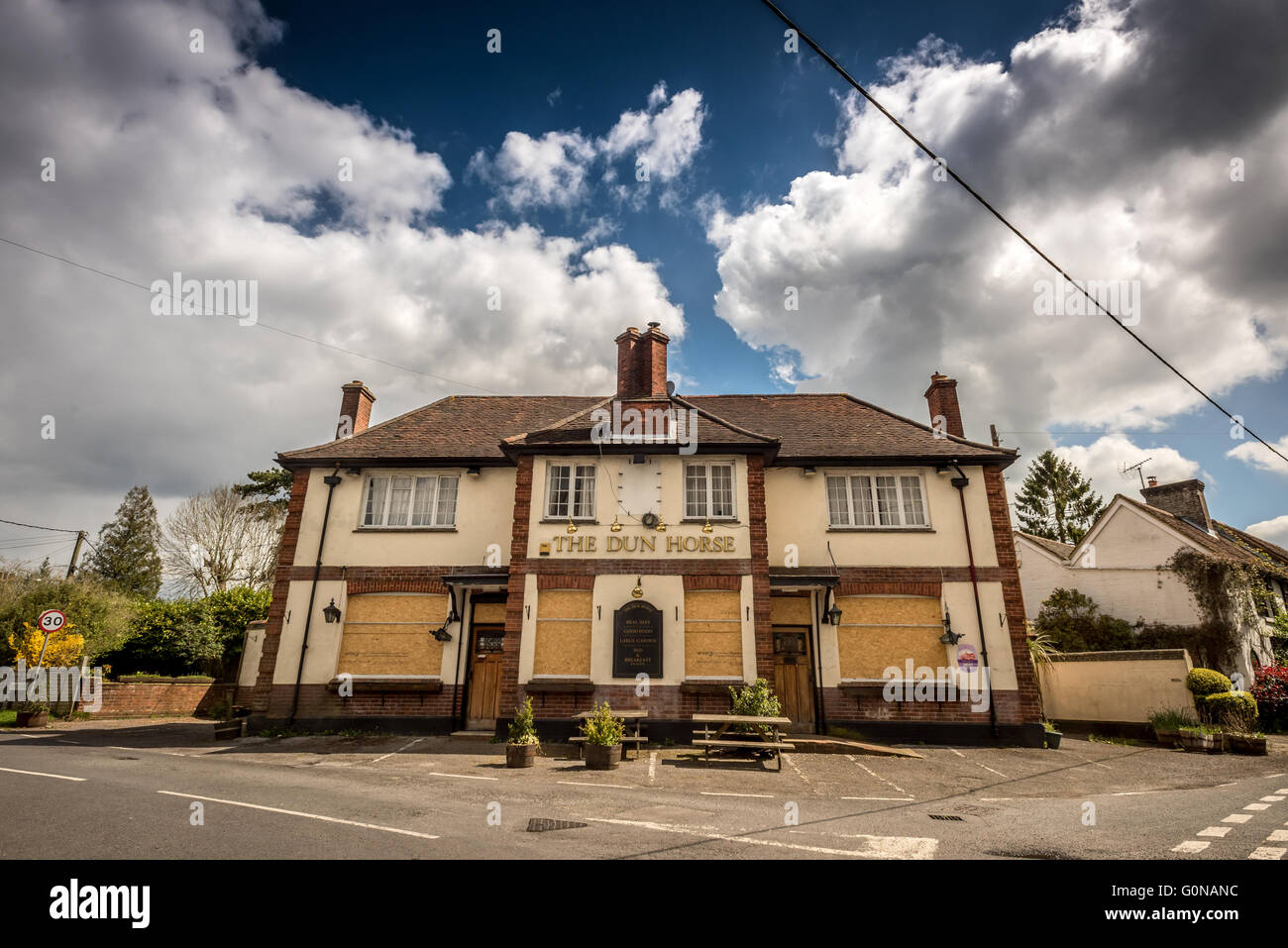 A derelict, closed-down rural pub in the countryside of Britain. Stock Photo