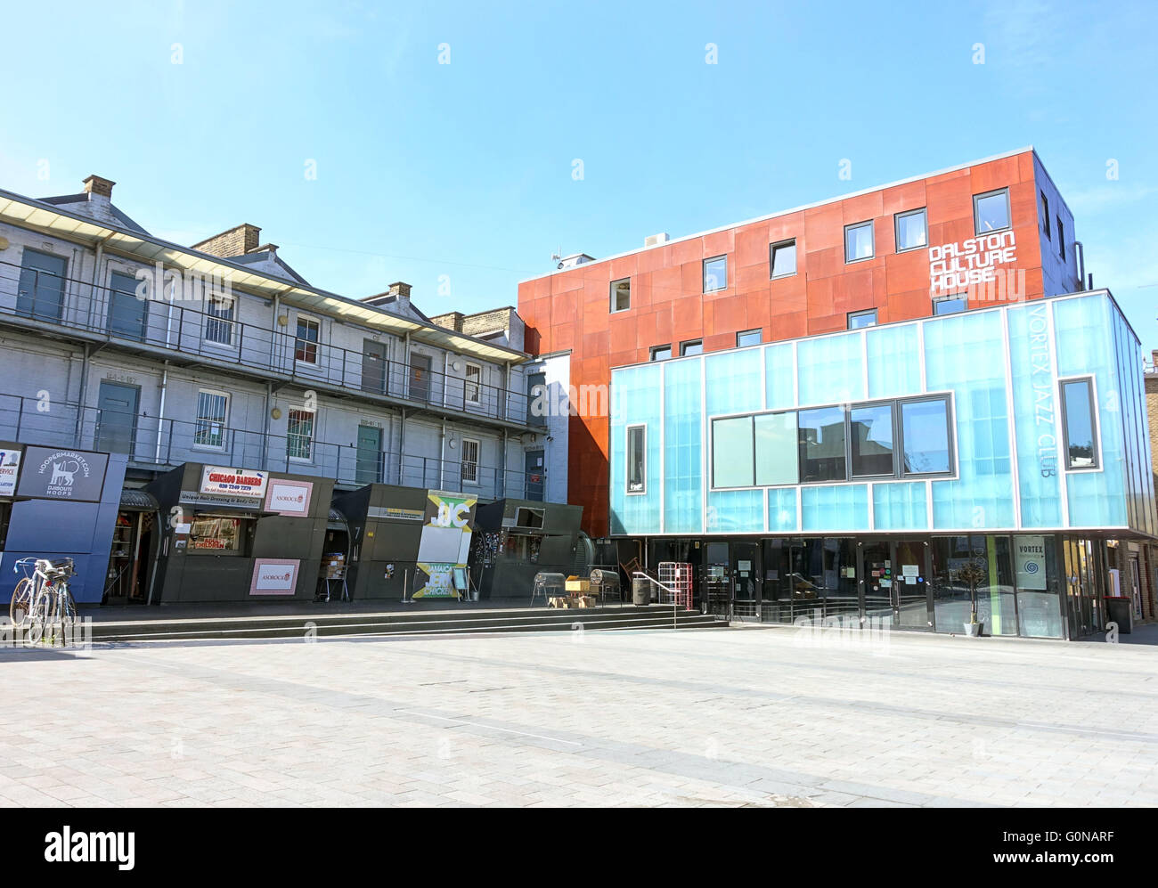 Gentrification in Dalston, East London - Dalston Culture House and Vortex Jazz Club in Gillett Square Stock Photo