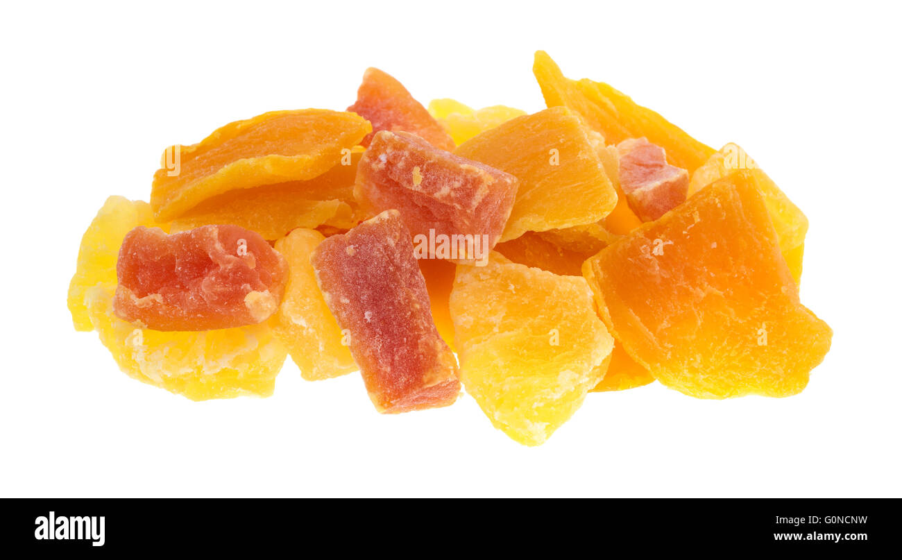 A serving of pineapple, mango and papaya sugared dried fruit isolated