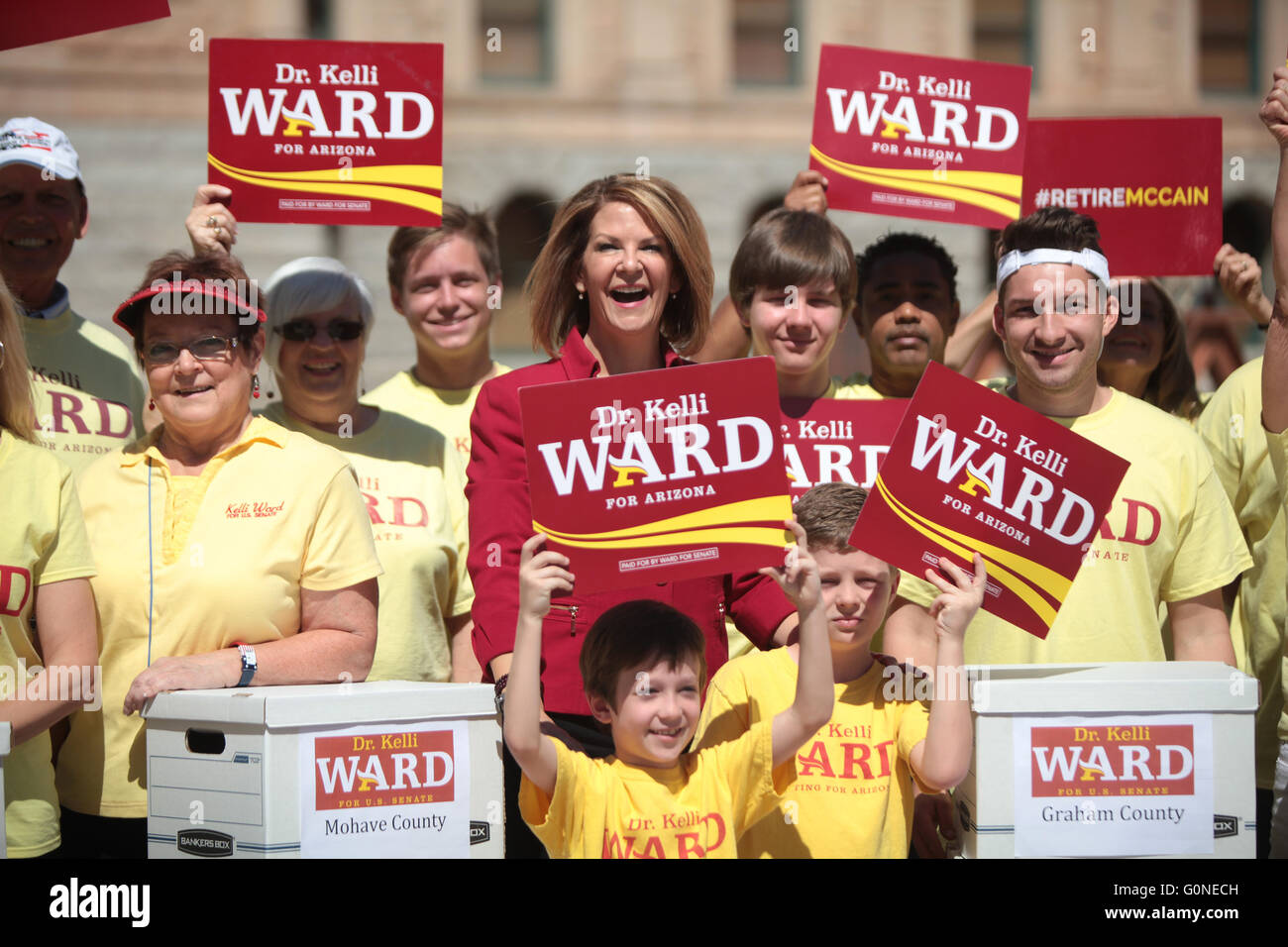 Former State Senator Kelli Ward stands with supporters outside the Arizona State Capitol building following her official filing for the 2016 U.S. Senate Republican primary to challenge long term Senator John McCain May 2, 2016 in Phoenix, Arizona. Stock Photo