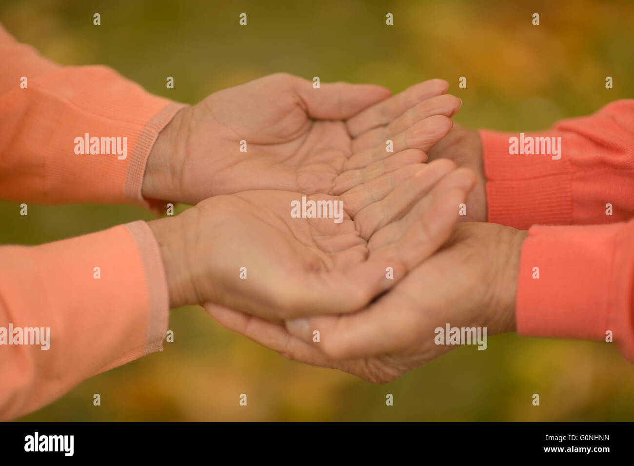 Couple of hands together Stock Photo