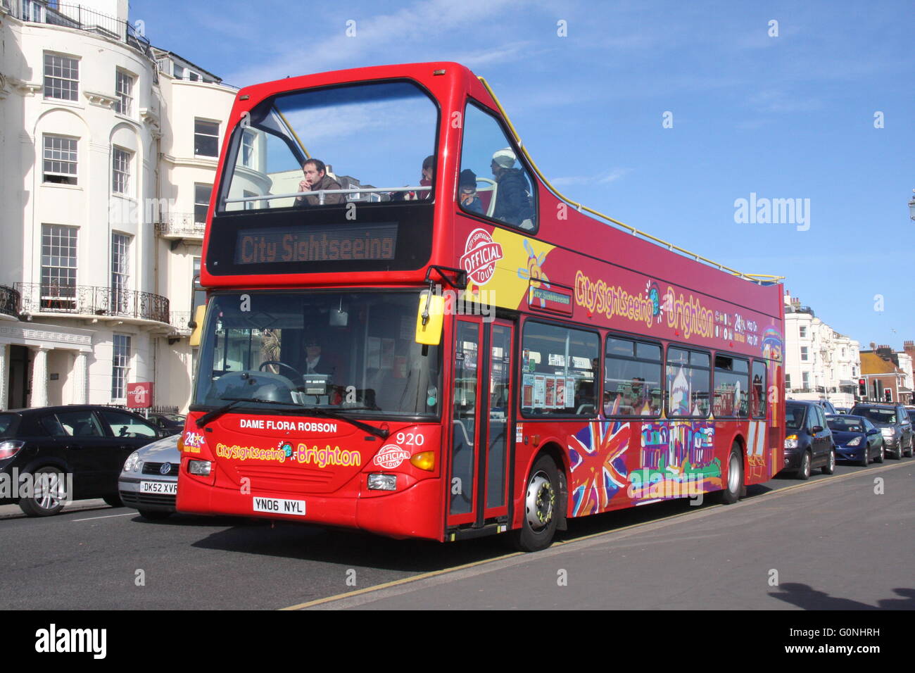 A DOUBLE DECK OPEN TOP RED BRIGHTON SIGHTSEEING TOUR BUS Stock Photo