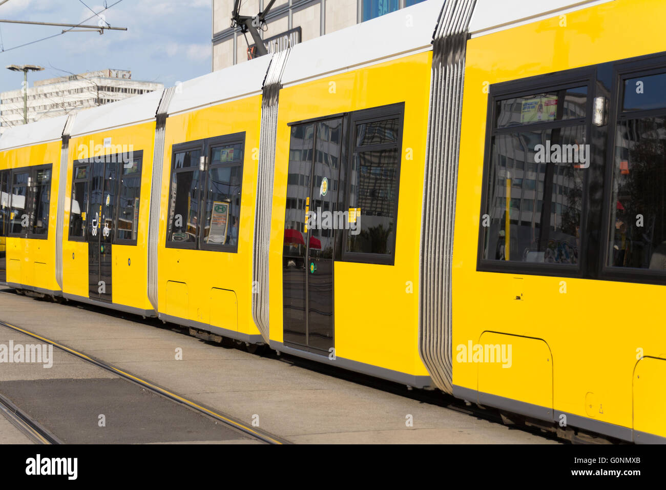 Electric tram train at Alexanderplatz in Berlin, Germany. Stock Photo