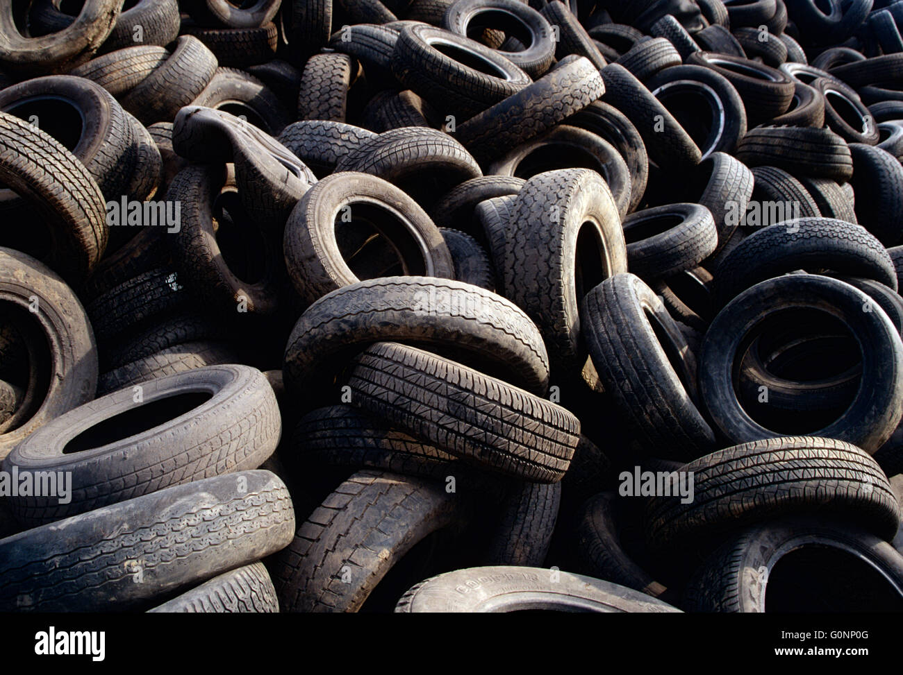 Landfill full of old automobile tires; upstate Pennsylvania; USA Stock Photo