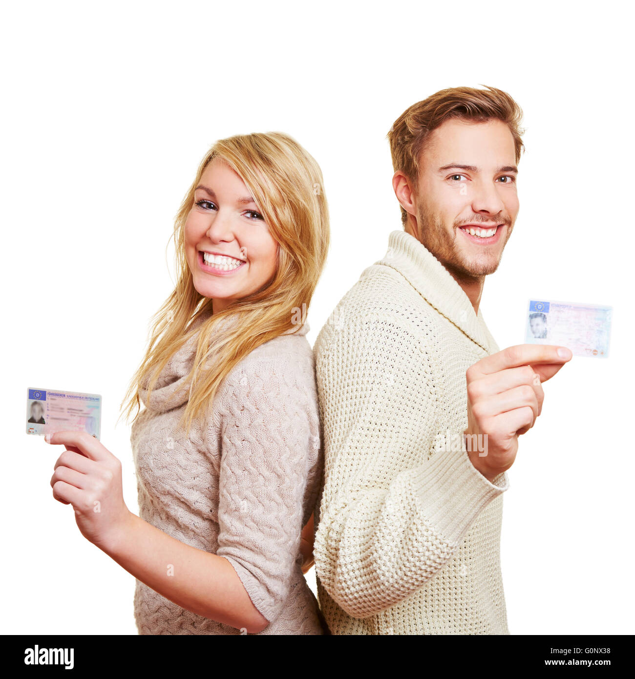 Young happy couple with their new European driving licence Stock Photo