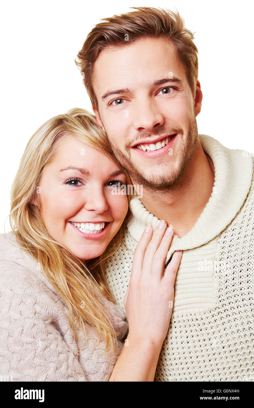 Happy young couple looking directly into the camera Stock Photo