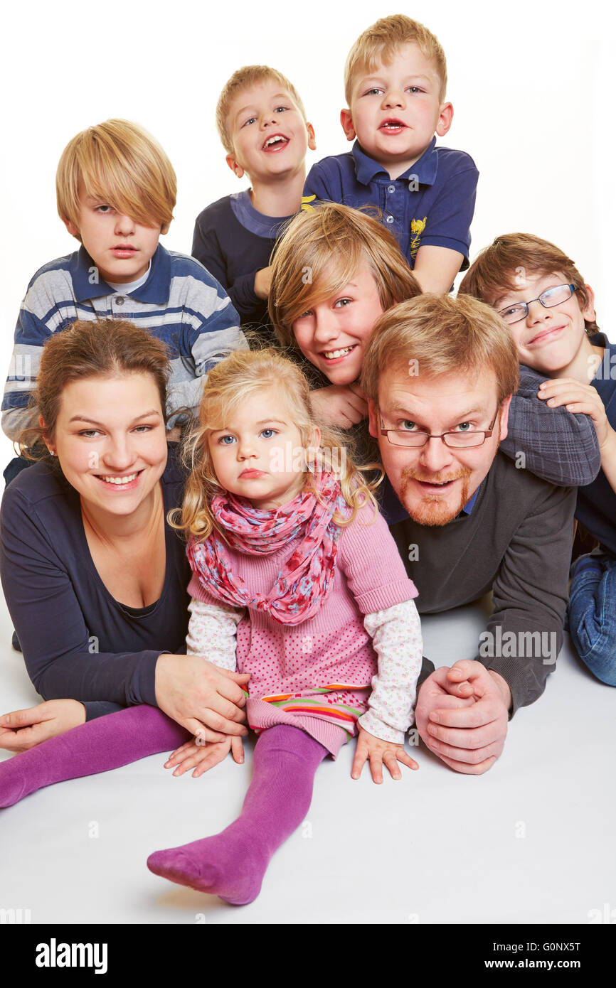 Portrait of a family with five boys and one girl Stock Photo - Alamy