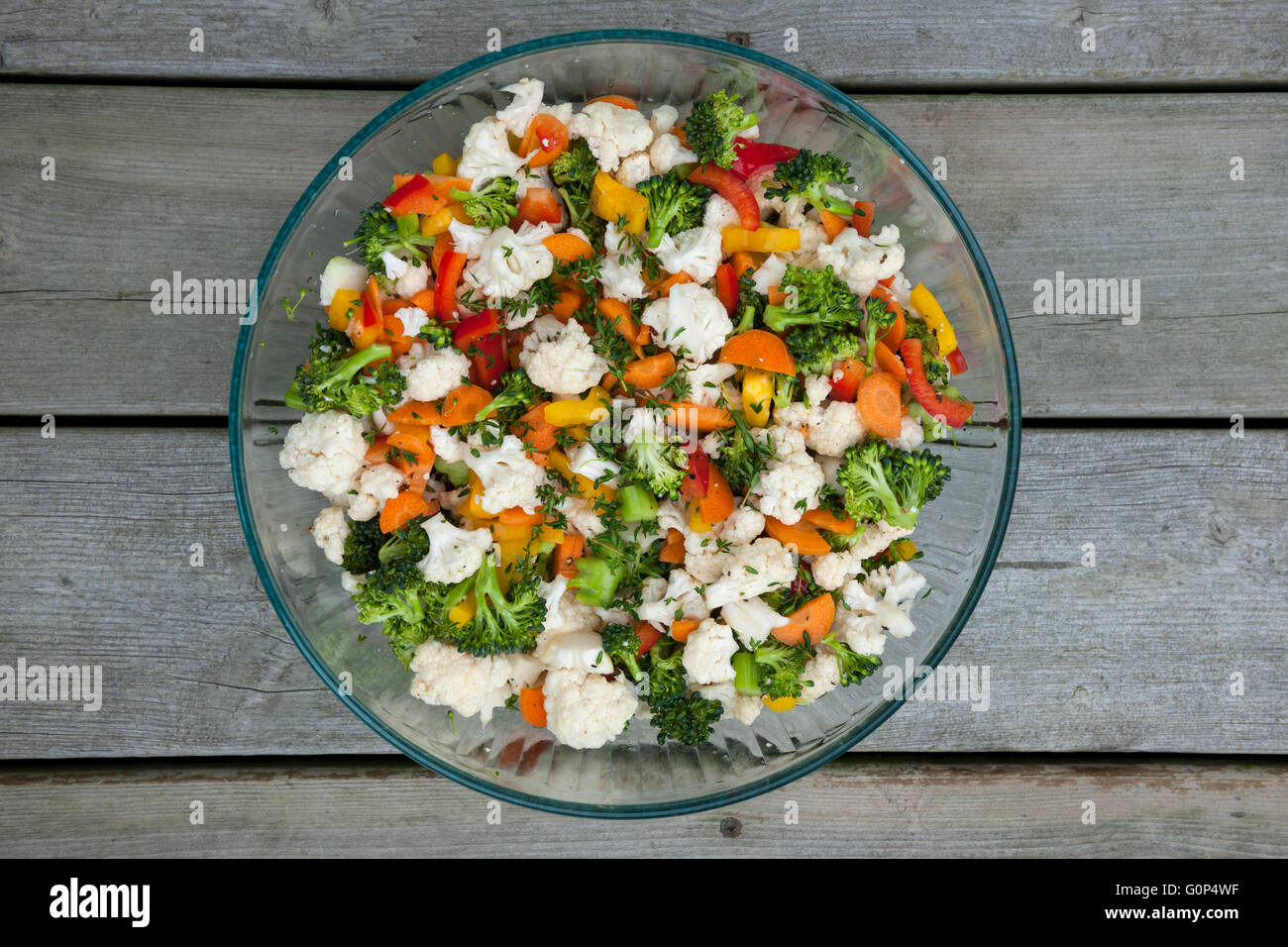 Fresh vegetable salad with cauliflower, broccoli, carrots and peppers