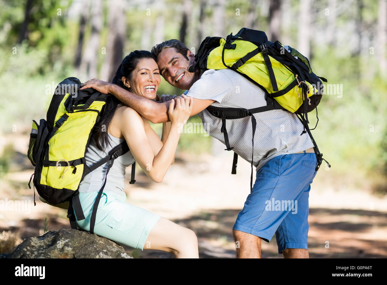 Couple smiling and holding each other Stock Photo - Alamy