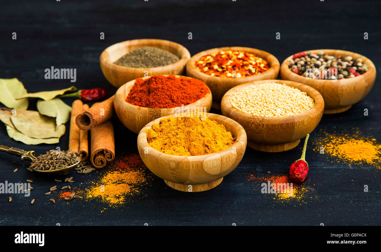 Indian spices with ground pepper,ginger, chili flakes, pepper seeds