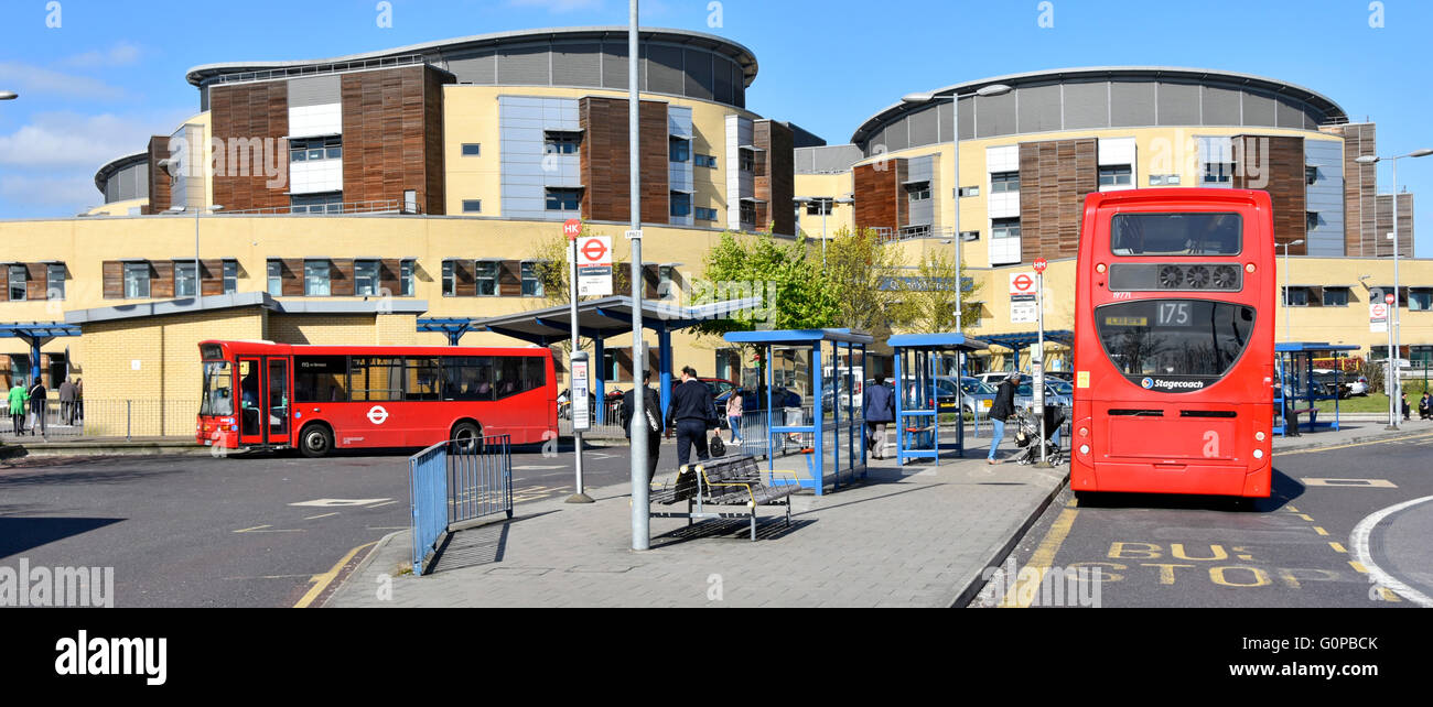 Patient transport logistics via tfl for people waiting at bus stop at Queens General Hospital Romford East London Borough of Havering England UK Stock Photo
