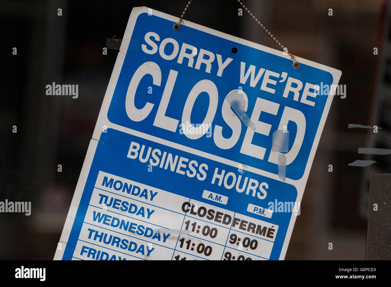 Closed sign at a store downtown Kingston, Ont., on May 2, 2016 Stock