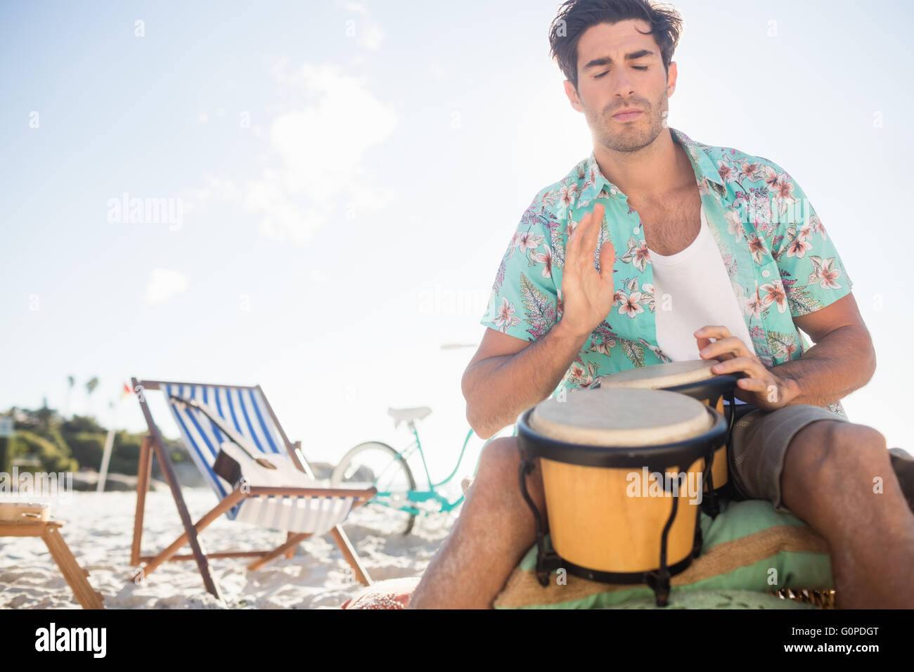 Passionate man playing drums Stock Photo