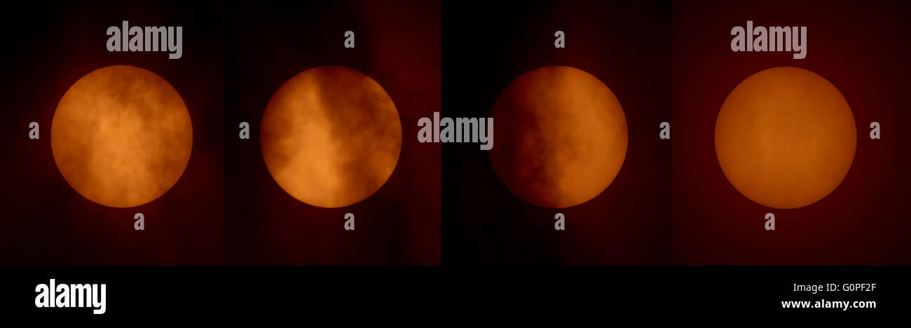 London, UK. 3rd May, 2016. Sequence of solar filtered telescope images show 5 groups of small sunspots dotted around the sun, visible through intermittent cloud. Astronomers worldwide are gearing up for the main event on Monday 9th May, the rare transit of the planet Mercury across the disk of the sun beginning at 11:12 UT (GMT) and ending 18:42 UT (GMT), and visible with telescopes fitted with solar filters. The next Mercury transits will take place in 2019 and 2032. Credit: Malcolm Park editorial/Alamy Live News Stock Photo