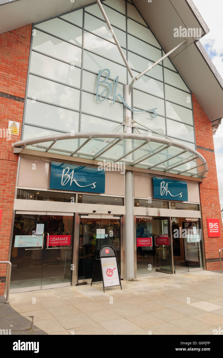 BHS or British Home Stores shop display in Wrexham Wales with clearance sale signs the retail company filed for administration in 2016 Stock Photo