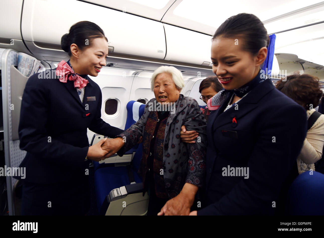 Stewardess china hi-res stock photography and images - Alamy