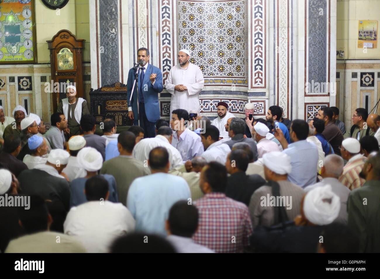Cairo, Egypt. 3rd May, 2016. Muslims speak during a ritual ceremony to ...