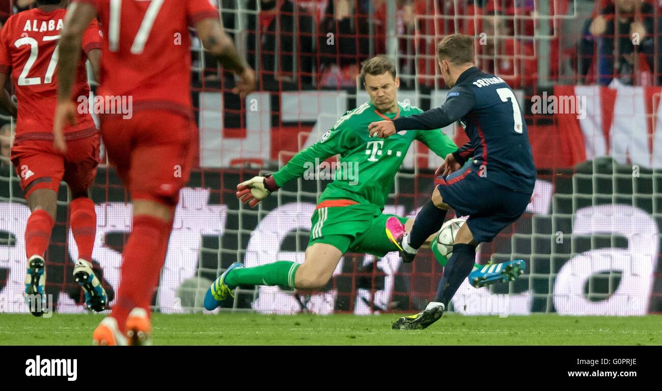 bayern-munich-s-goalkeeper-manuel-neuer-l-and-madrid-s-antoine