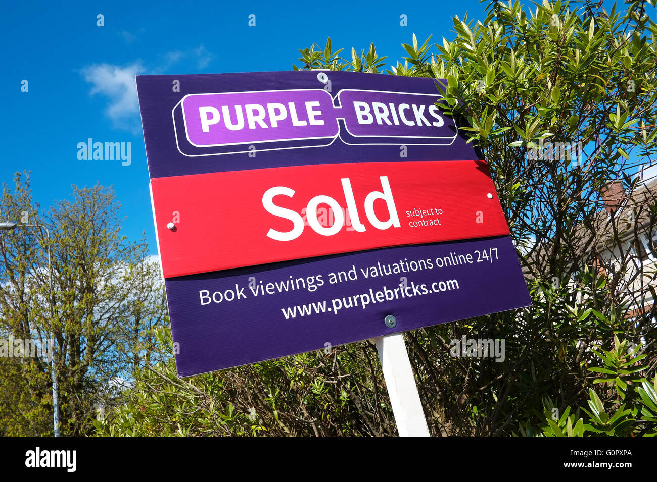 purple bricks, online, web based estate agents sign board Stock Photo