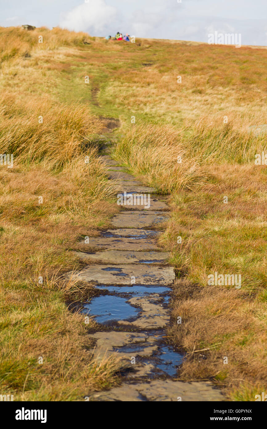 Stone pavement crossing the moors in the Derbyshire Peaks England UK Stock Photo