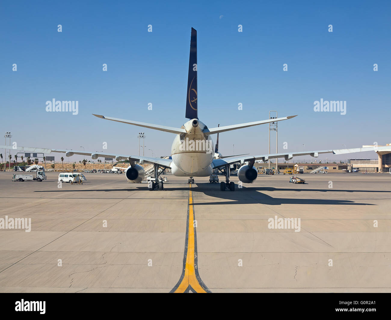Riyadh - March 01:  Planes preparing for take off at Riyadh King Khalid Airport on March 01, 2016 in Riyadh, Saudi Arabia. Riyad Stock Photo