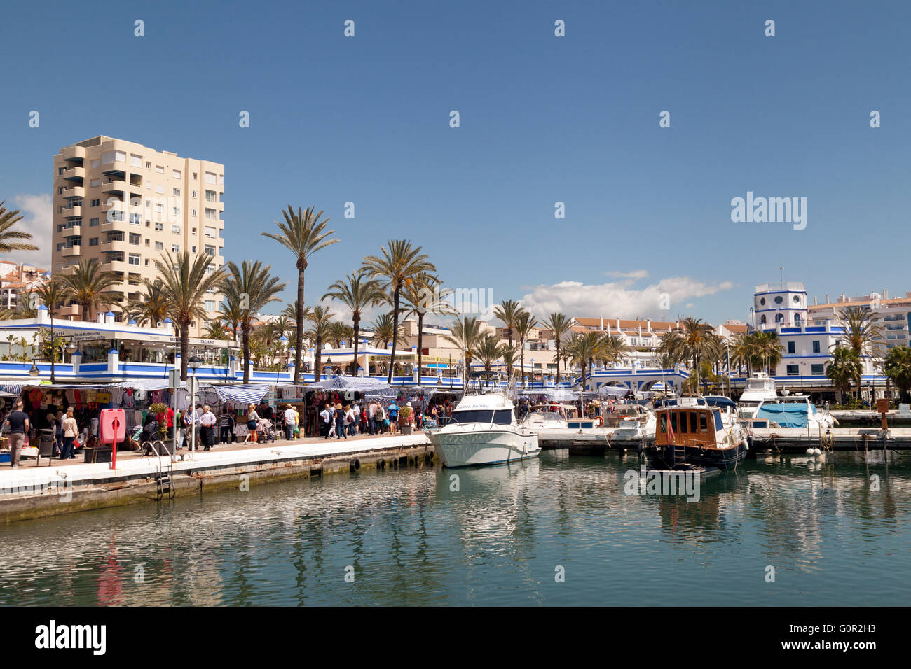 Estepona marina and sunday market on a sunny day in April, Estepona, Costa del Sol, Andalusia Spain Europe Stock Photo