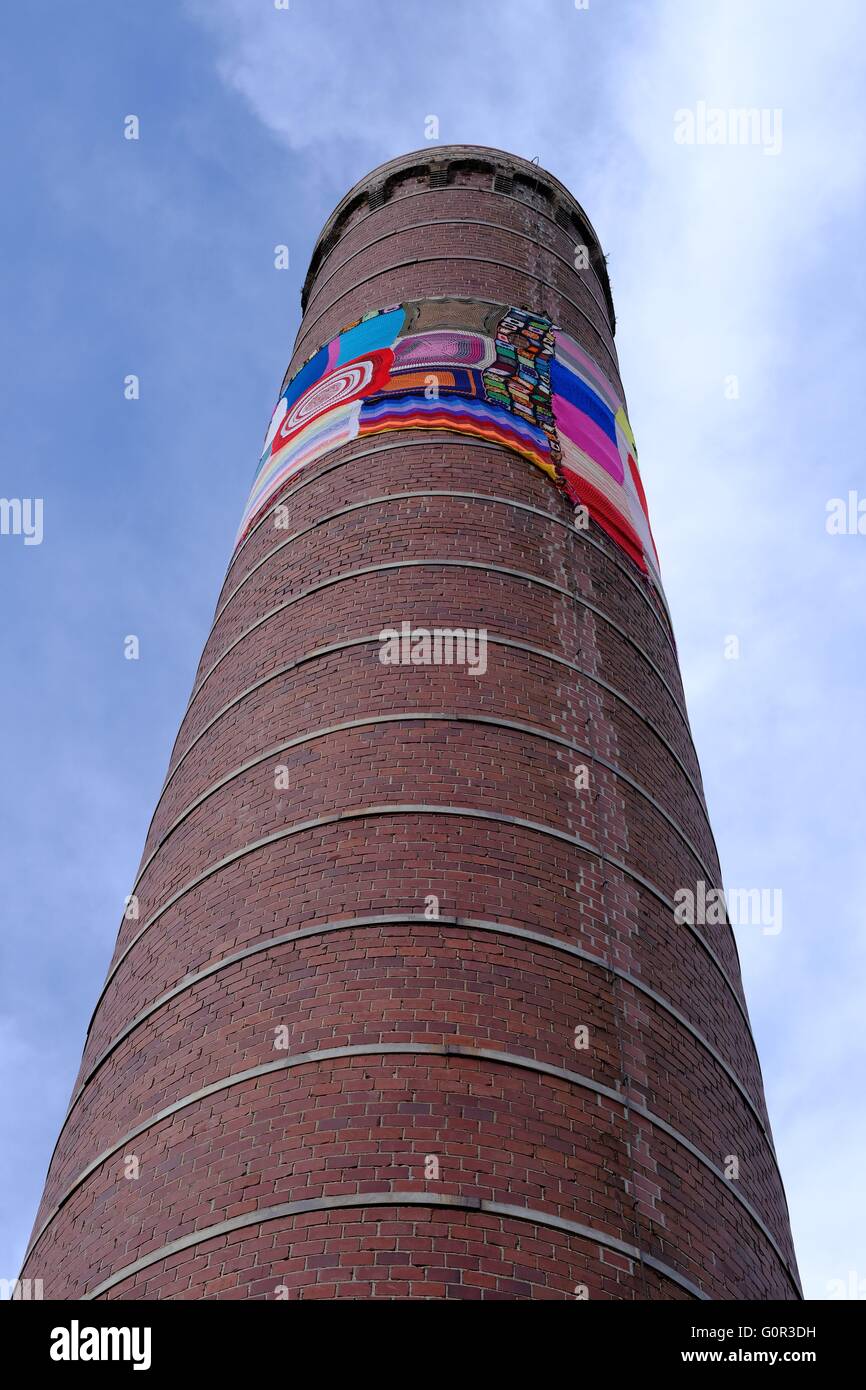 Big brick smoke stack against sky with signs Stock Photo - Alamy
