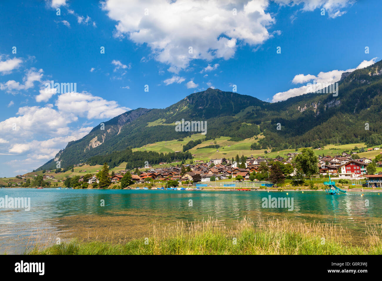 Stunning view of the small town Lungern on the lake side of Lungernsee on Bernese Oberland of Switzerland. This town lies on the Stock Photo