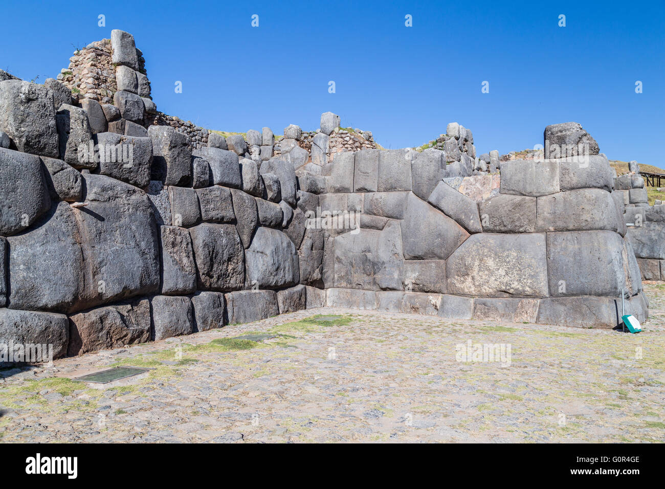 Stone Walls at Saksaywaman, Saqsaywaman, Sasawaman, Saksawaman, Sacsahuayman, Sasaywaman or Saksaq Waman fortress in Cusco, Peru Stock Photo