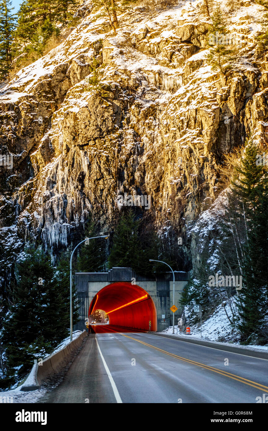 One of the Many Tunnels in the Fraser Canyon as the road winds through the rugged mountains of the Coastal Mountain range in BC, Canada Stock Photo