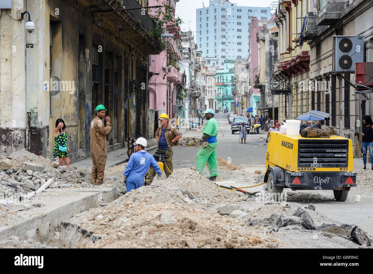 Workmen digging trenches in Old Havana to lay new electricity and water supplies, Havana, Cuba Stock Photo