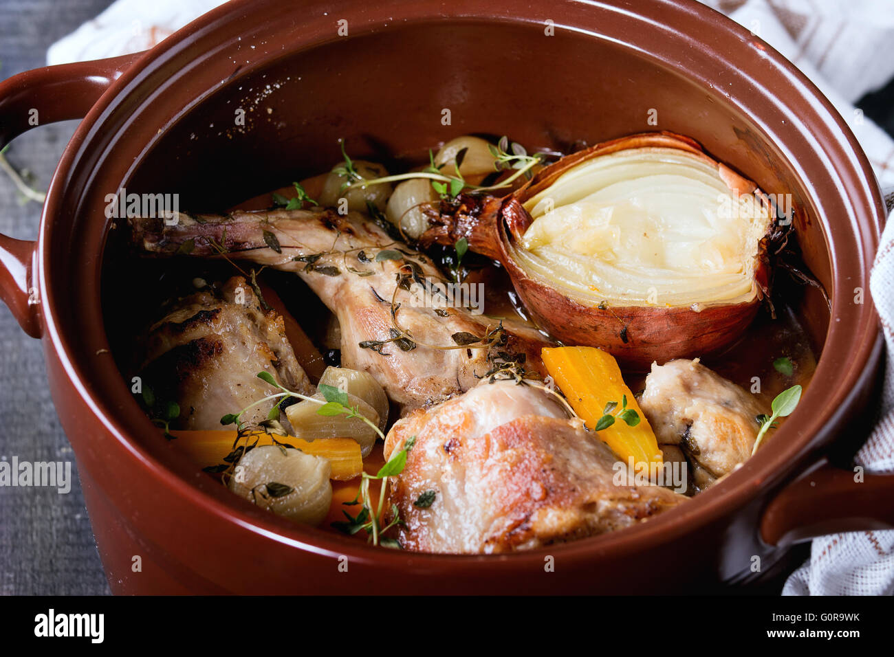 Stewed rabbit with vegetables Stock Photo - Alamy