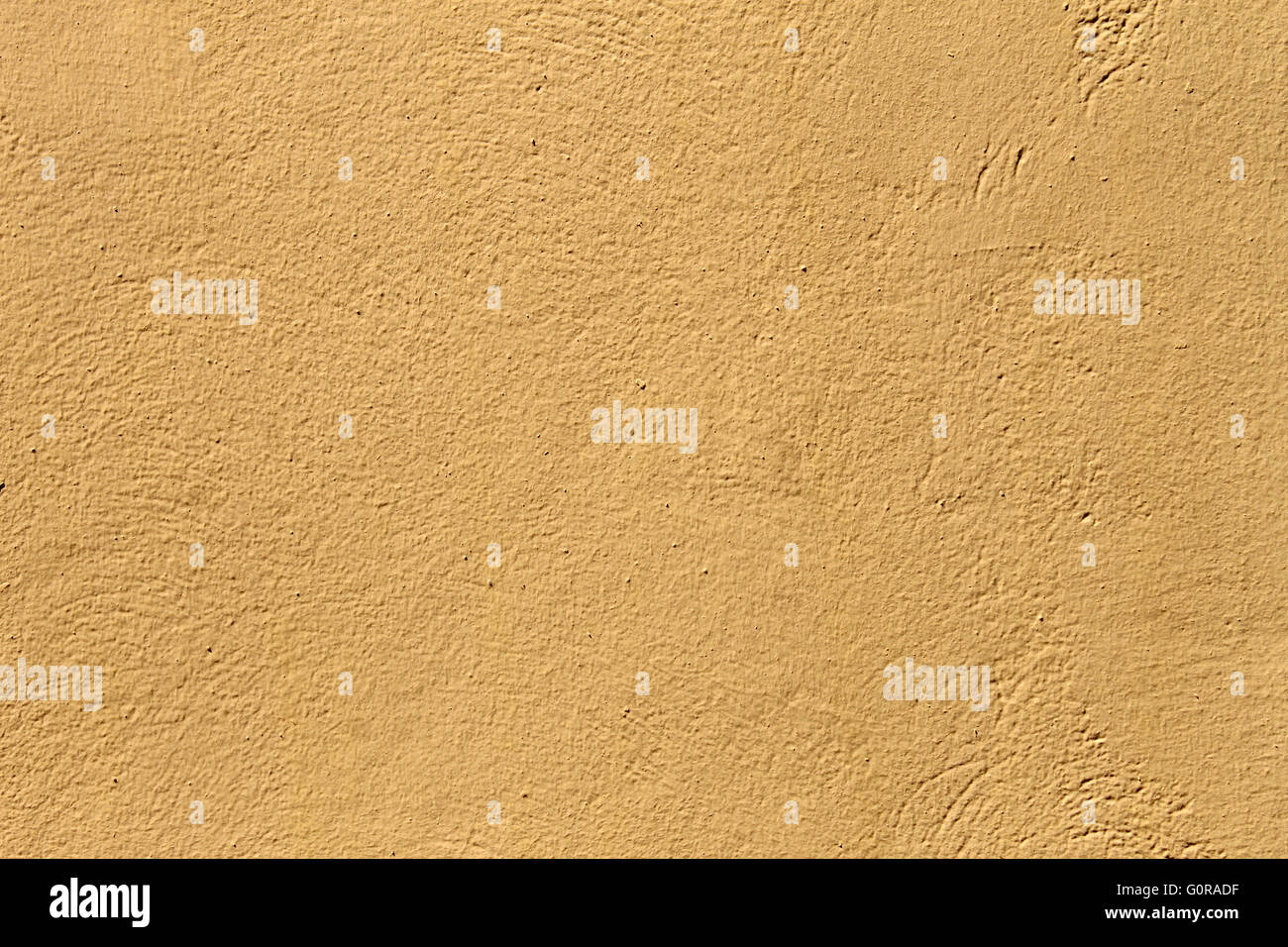 Abstract textured yellow stone background. Stock Photo