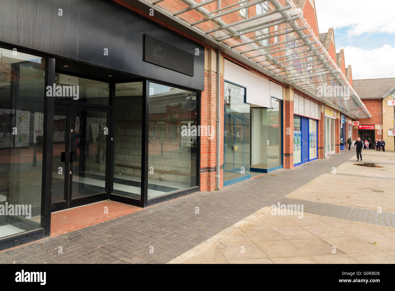Empty high street shopping development and store fronts on Henblas Square Wrexham North Wales Stock Photo