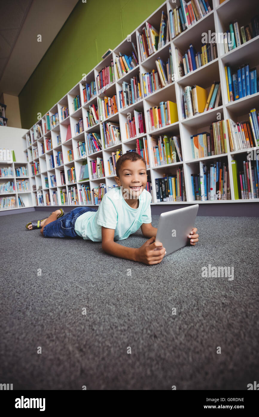 Little boy using a tablet Stock Photo - Alamy