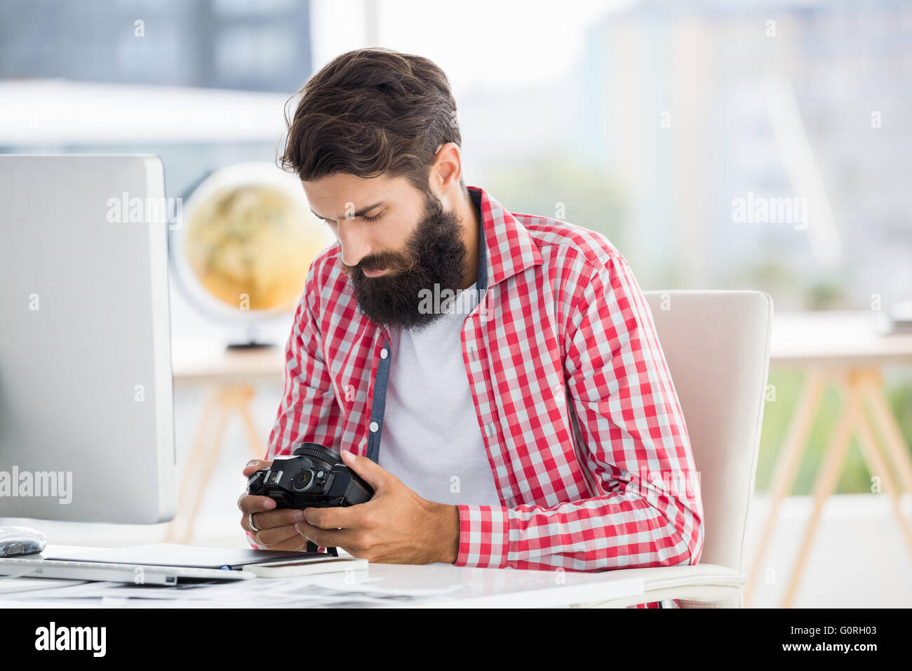 Hipster man taking picture Stock Photo - Alamy