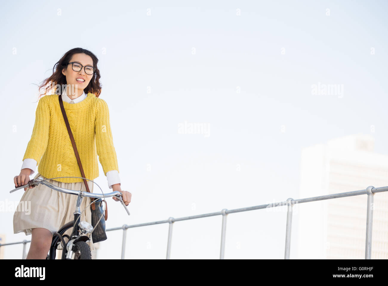 Hipster riding a bike Stock Photo