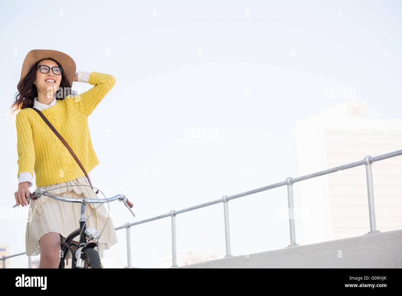 Hipster riding a bike Stock Photo