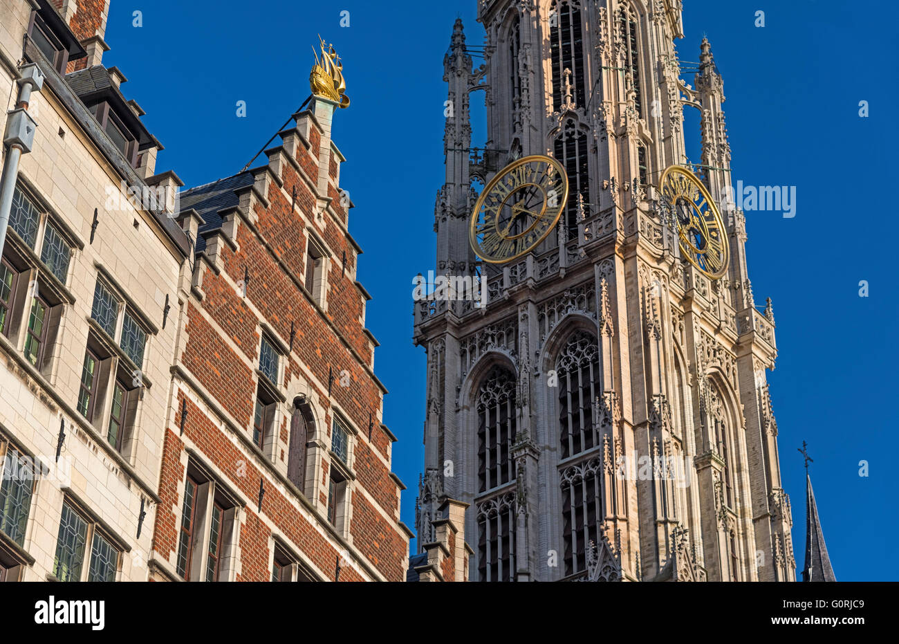 Cathedral spire and guildhouses Antwerp Belgium Stock Photo