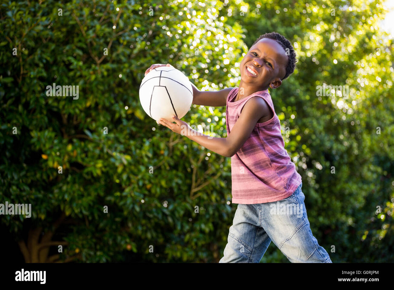 Boy catching ball hires stock photography and images Alamy