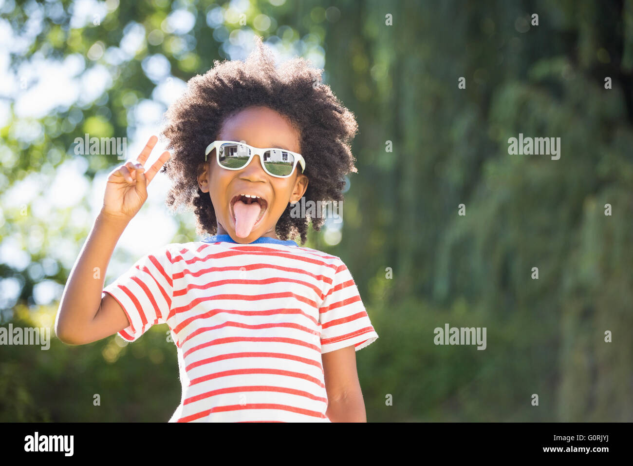 Boy is wearing sunglasses Stock Photo - Alamy