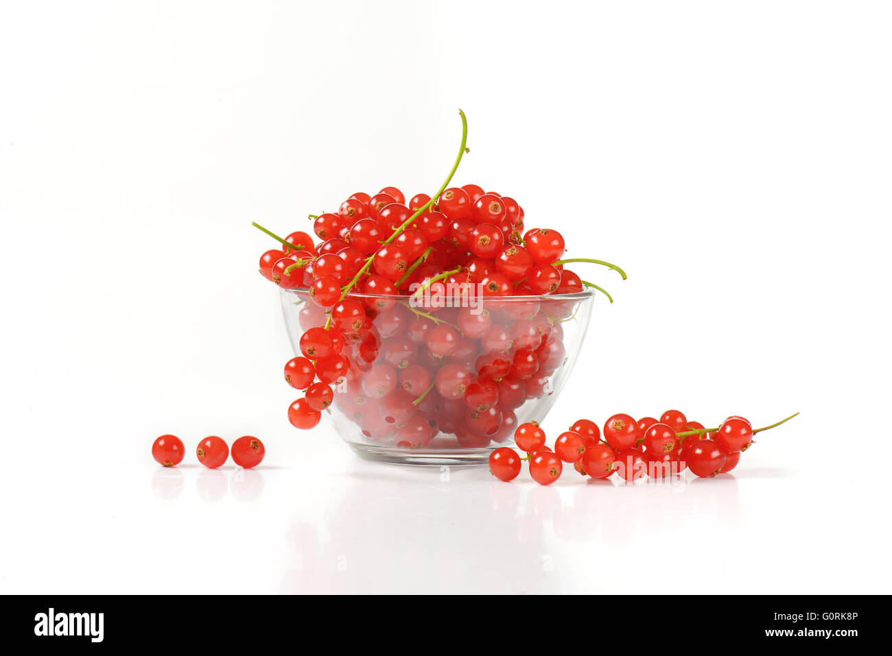 Fresh red currant berries in glass bowl Stock Photo