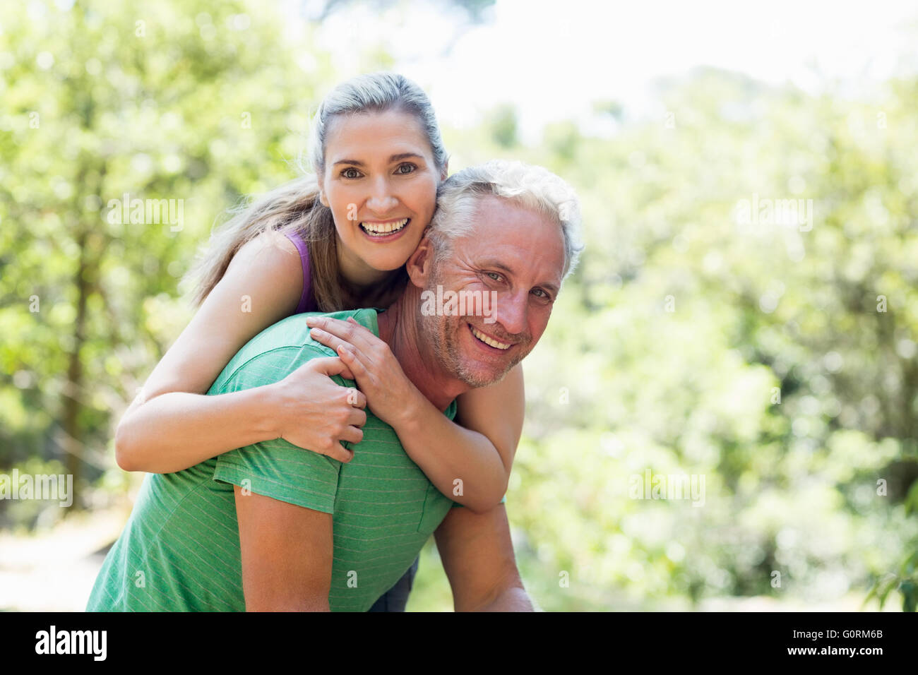 Couple smiling holding hi-res stock photography and images - Alamy