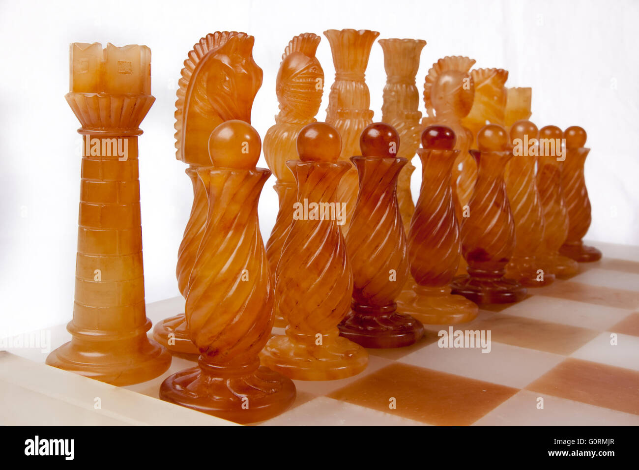 Chess board alabaster cutout on white background Stock Photo - Alamy