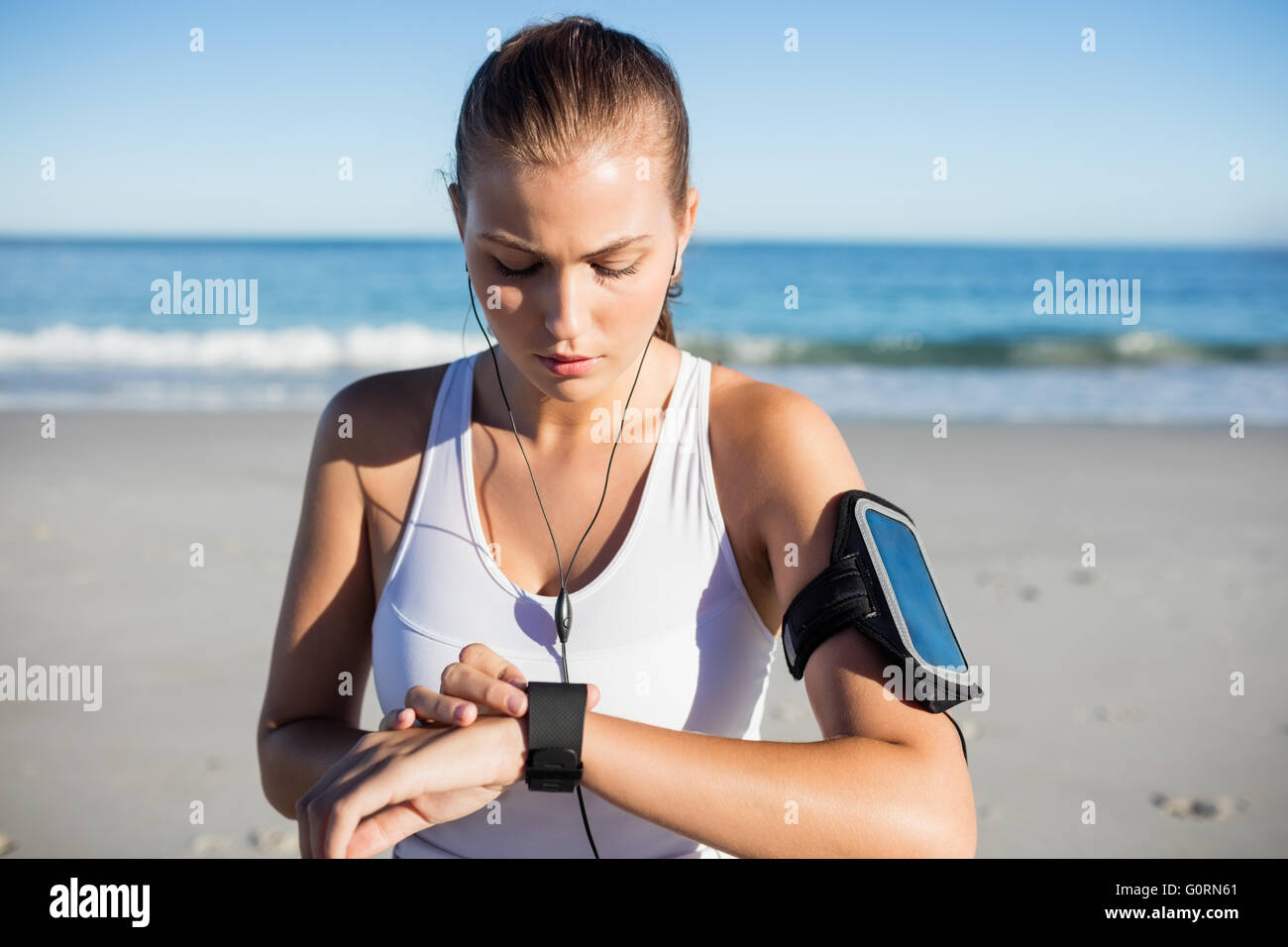 Fit woman on the beach Stock Photo - Alamy