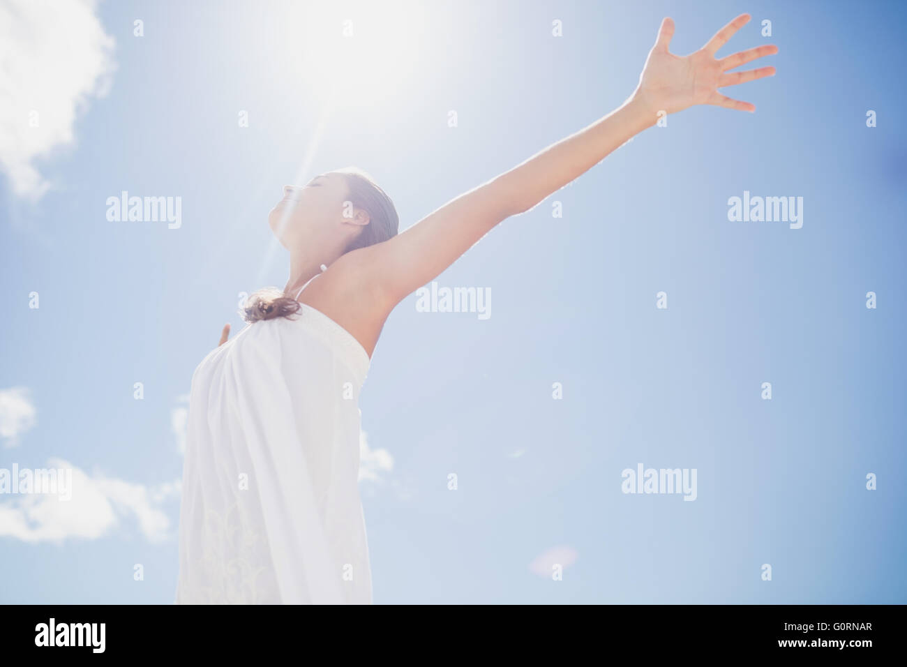 Portrait of smiling woman on the beach Stock Photo - Alamy