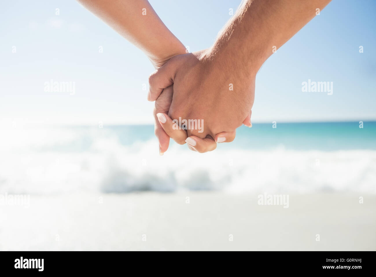 happy  couple holding hands Stock Photo